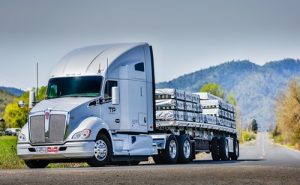 A flatbed truck on the road