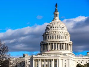 Exterior view of the United States Capitol Building on a sunny day